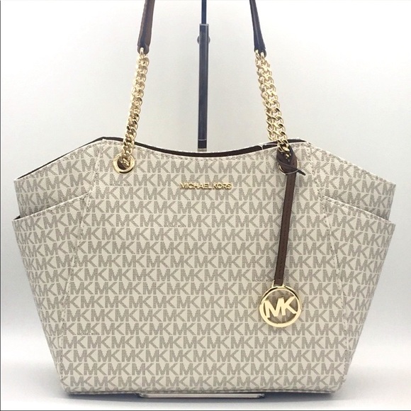 MICHAEL KORS LG CHAIN SHOULDER TOTE VANILLA
NWT - Picture 11 of 16